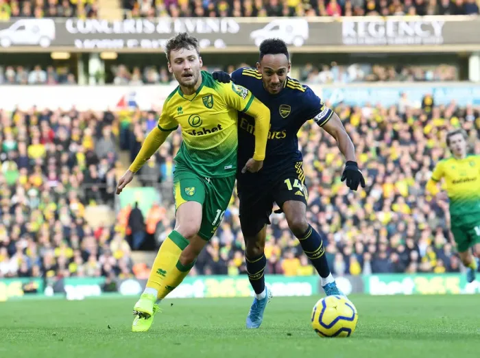 Framed Print : Aubameyang vs Trybull: Battle at Carrow Road - Norwich City vs Arsenal FC, Premier League 2019-20 Framed Print : Aubameyang vs Trybull: Battle at Carrow Road - Norwich City vs Arsenal FC, Premier League 2019-20