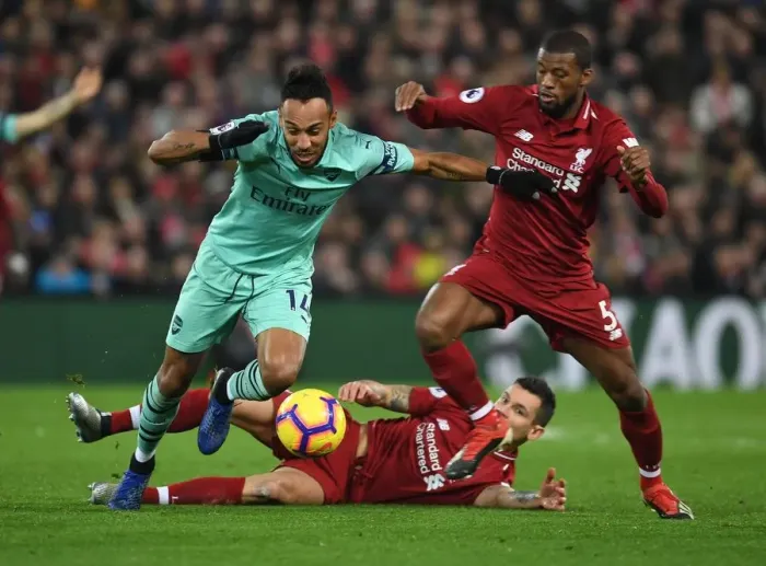 Framed Print : Aubameyang vs. Wijnaldum: A Premier League Rivalry Ignites at Anfield Framed Print : Aubameyang vs. Wijnaldum: A Premier League Rivalry Ignites at Anfield