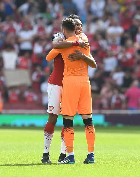 Aubameyang's Embrace: Arsenal's Victory Moment vs. West Ham United (2017-18)
