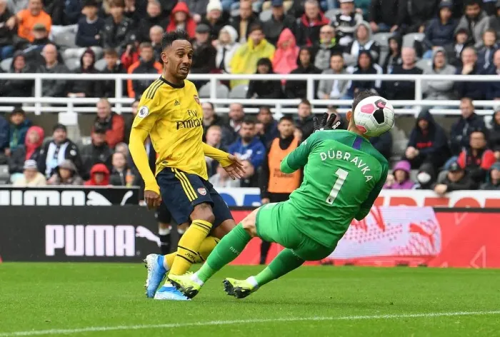 Framed Print : Aubameyang's Stunner: Arsenal Survives Newcastle Thriller in Premier League Opener Framed Print : Aubameyang's Stunner: Arsenal Survives Newcastle Thriller in Premier League Opener