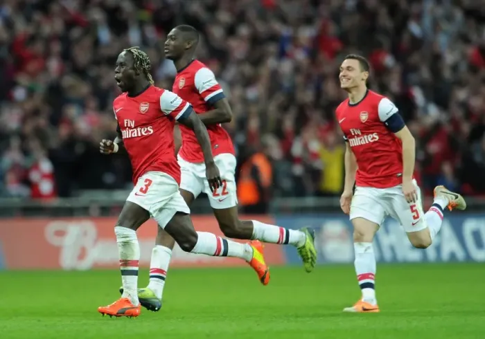 Framed Print : Bacary Sagna (Arsenal) celebrates winning the penalty shoot out. Arsenal 1: 1 Wigan Athletic