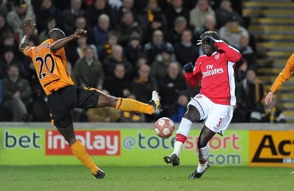 Bacary Sagna (Arsenal) George Boateng (Hull). Hull City 1: 2 Arsenal, Barclays Premier League