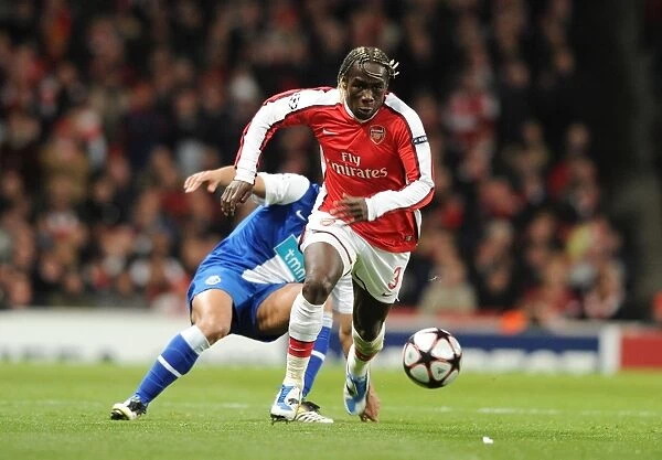 Bacary Sagna (Arsenal) Hulk (Porto). Arsenal 5: 0 FC Porto, UEFA Champions League First Knockout Round, Second Leg, Emirates Stadium, Arsenal Football Club, London, 9  /  3  /  2010. Credit : Stuart MacFarlane  / 