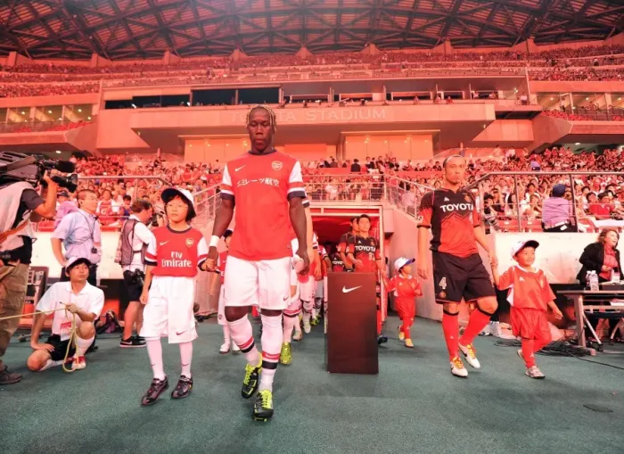 Framed Print : Bacary Sagna and Arsenal Mascot Prepare for Nagoya Grampus Match, 2013