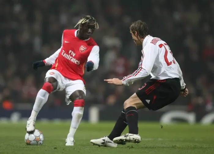Framed Print : Bacary Sagna (Arsenal) Massimo Ambrosini (AC Milan)