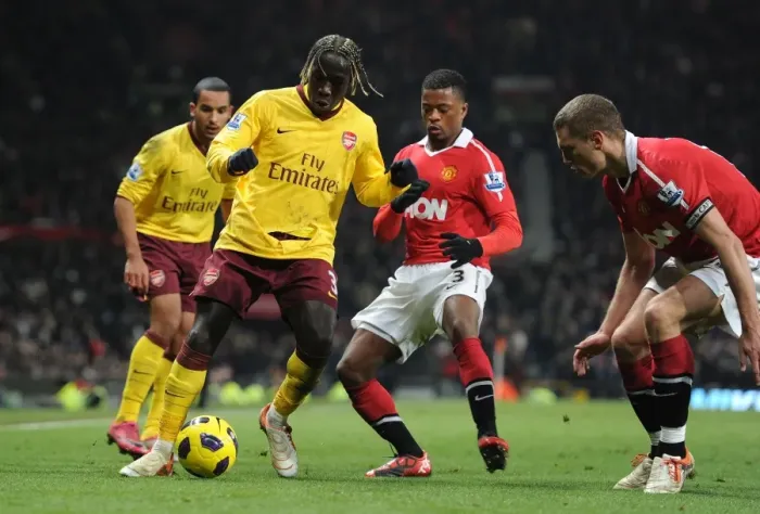 Framed Print : Bacary Sagna (Arsenal) Patrice Evra and Nemanja Vidic (Man United). Manchester United 1