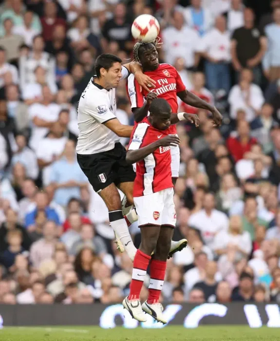Framed Print : Bacary Sagna and Emmanuel Eboue (Arsenal) Clint Dempsey (Fulham) Framed Print : Bacary Sagna and Emmanuel Eboue (Arsenal) Clint Dempsey (Fulham)