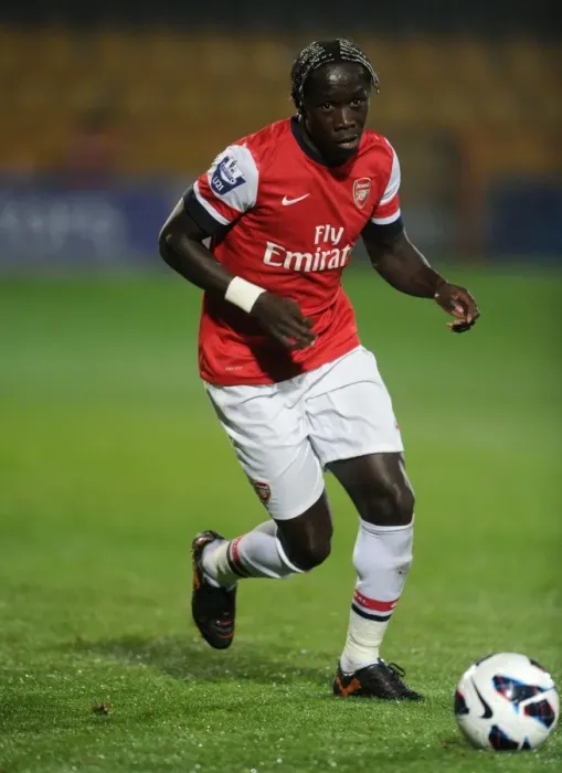 Framed Print : Bacary Sagna Leads Arsenal U21 Against Reading U21 in 2012-13