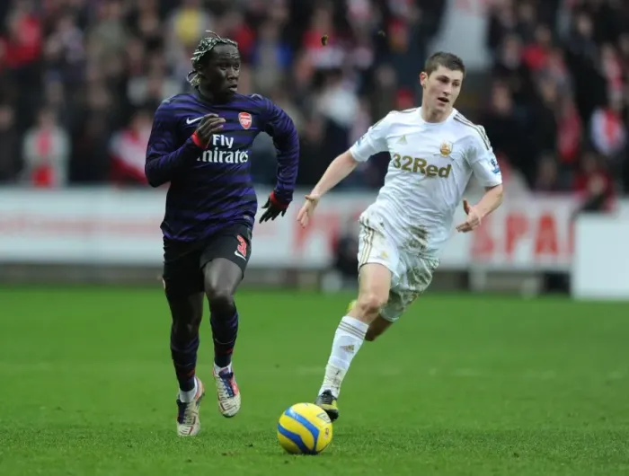 Framed Print : Bacary Sagna Outmaneuvers Ben Davies in FA Cup Clash: Swansea vs Arsenal Framed Print : Bacary Sagna Outmaneuvers Ben Davies in FA Cup Clash: Swansea vs Arsenal