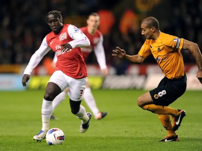 Framed Print : Bacary Sagna Outmaneuvers Carl Henry: Wolverhampton Wanderers vs. Arsenal, Premier League, 2012