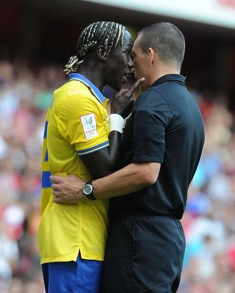 Bacary Sagna vs. Referee Kevin Friend: A Heated Argument at the Emirates Cup Match between Arsenal and Napoli (2013)