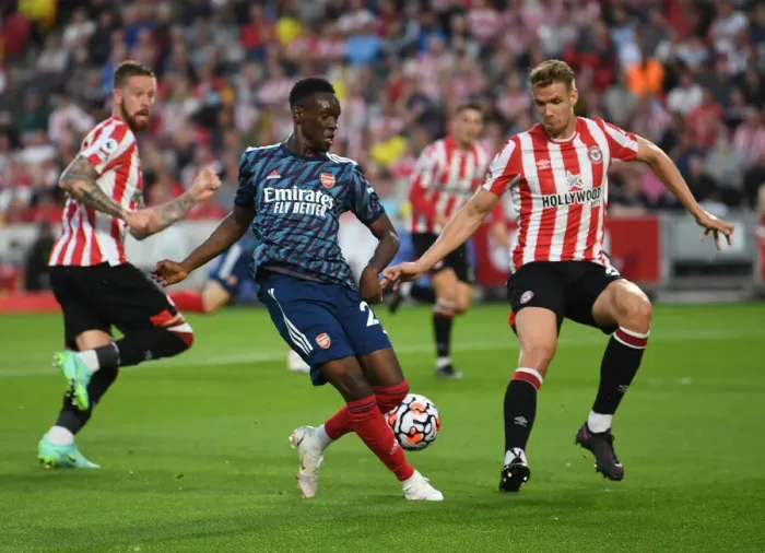Framed Print : Backheel Battle: Flo Balogun vs. Kristoffer Ajer - A Premier League Showdown