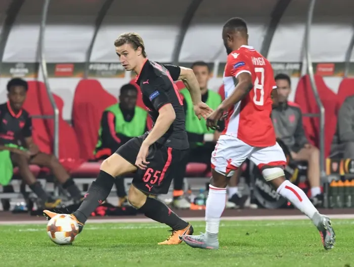 Framed Print : Battle for the Ball: Ben Sheaf vs. Guelor Kanga in Europa League Clash between Crvena Zvezda and Arsenal