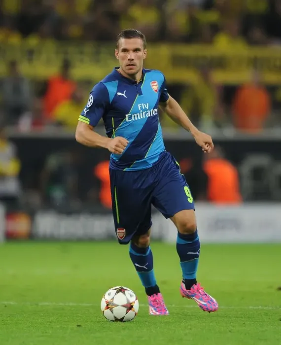 Framed Print : Battle of the Borussias: Podolski's Emotional Clash in Dortmund - Arsenal vs. Borussia Dortmund, UEFA Champions League, 2014
