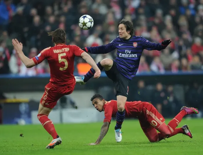 Framed Print : Battle for Control: Rosicky vs. van Buyten and Gustavo (Bayern Munich vs. Arsenal, UEFA Champions League 2013) Framed Print : Battle for Control: Rosicky vs. van Buyten and Gustavo (Bayern Munich vs. Arsenal, UEFA Champions League 2013)
