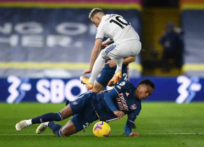 Framed Print : Battle at Elland Road: Willock vs. Alioski - A Premier League Clash of Supremacy