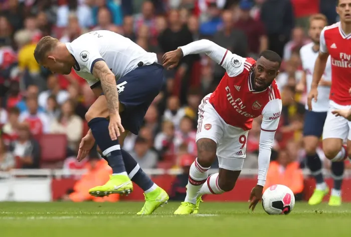 Framed Print : Battle at the Emirates: Lacazette vs. Alderweireld - Arsenal vs. Tottenham Premier League Showdown Framed Print : Battle at the Emirates: Lacazette vs. Alderweireld - Arsenal vs. Tottenham Premier League Showdown