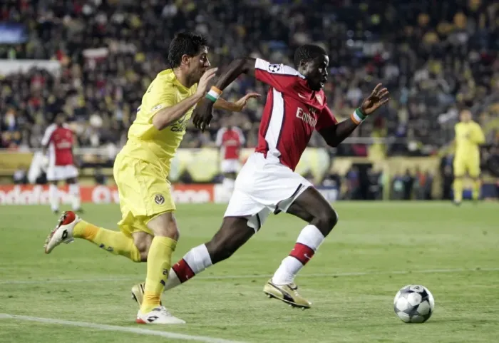 Framed Print : Battle of the Full-backs: Eboue vs. Capdevila in the 2009 UEFA Champions League Quarterfinal Framed Print : Battle of the Full-backs: Eboue vs. Capdevila in the 2009 UEFA Champions League Quarterfinal