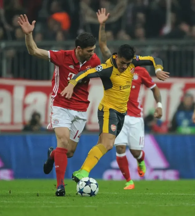 Framed Print : Battle of Midfield: Alexis Sanchez vs Xabi Alonso - Arsenal vs Bayern Munich, UEFA Champions League 2016-17