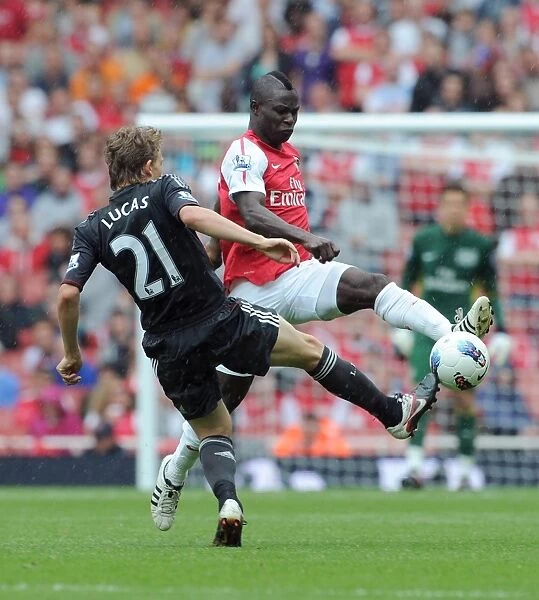 Battle of the Midfield: Frimpong vs. Lucas in Arsenal's 0:2 Loss to Liverpool (August 2011, Emirates Stadium)