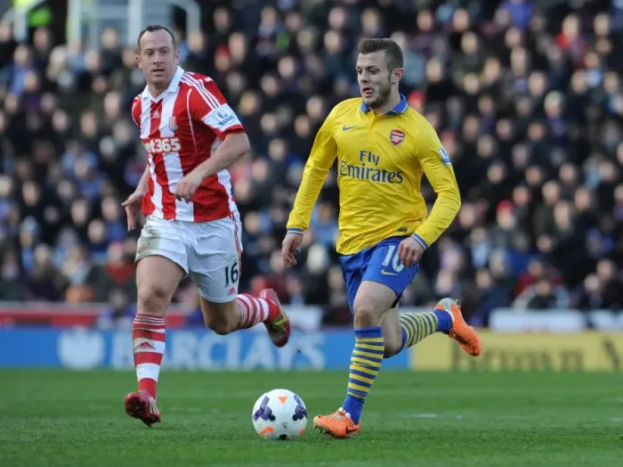 Framed Print : Battle in the Midfield: Jack Wilshere vs. Charlie Adam, Premier League 2013-14