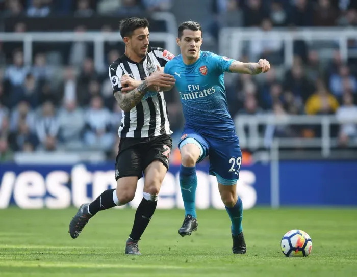 Framed Print : Battle in the Midfield: Xhaka Outmaneuvers Merino, Premier League 2017-18 - Arsenal's Xhaka Tops Newcastle's Merino in Epic Clash Framed Print : Battle in the Midfield: Xhaka Outmaneuvers Merino, Premier League 2017-18 - Arsenal's Xhaka Tops Newcastle's Merino in Epic Clash