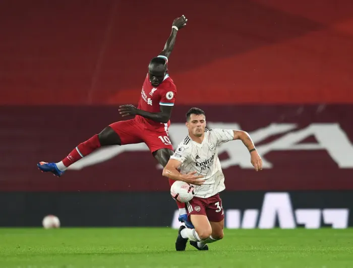 Framed Print : Battle of the Midfield: Xhaka vs Mane - Liverpool vs Arsenal, Premier League 2020-21 (Empty Anfield)