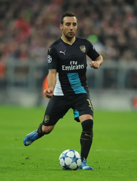Framed Print : Battle in Munich: Santi Cazorla's Determined Performance for Arsenal in the 2015 Champions League Clash against Bayern Munich