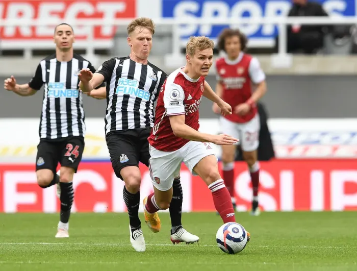 Framed Print : Empty Battle: Odegaard vs Ritchie, Arsenal vs Newcastle, Premier League 2021 (Behind Closed Doors)