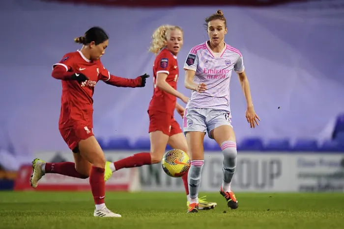 Framed Print : Battle for Possession: Liverpool vs. Arsenal - Women's Super League Clash