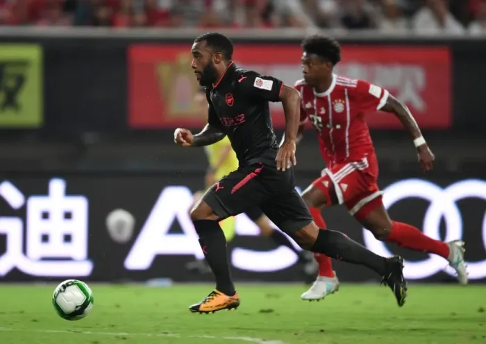 Framed Print : Battle in Shanghai: Lacazette vs. Alaba - Arsenal Forward's Duel with Bayern Munich Defender Framed Print : Battle in Shanghai: Lacazette vs. Alaba - Arsenal Forward's Duel with Bayern Munich Defender