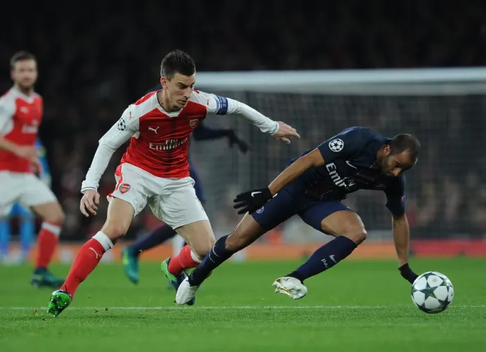 Framed Print : Battle of the Stars: Koscielny vs. Moura in Arsenal vs. Paris Saint-Germain UCL Clash Framed Print : Battle of the Stars: Koscielny vs. Moura in Arsenal vs. Paris Saint-Germain UCL Clash