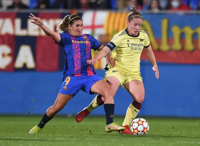 Framed Print : Battle for Supremacy: Kim Little vs Mariona Caldentey in Barcelona's Champions League Clash with Arsenal Women
