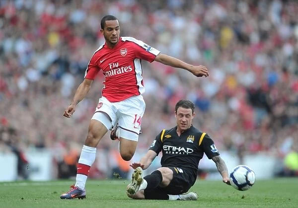 The Battle of the Wings: Walcott vs. Bridge - A Scoreless Stalemate in the Arsenal-Manchester City Clash, FA Premier League, 2010