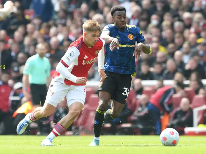Framed Print : Battle of Young Stars: Smith Rowe vs Elanga in Arsenal vs Manchester United Showdown