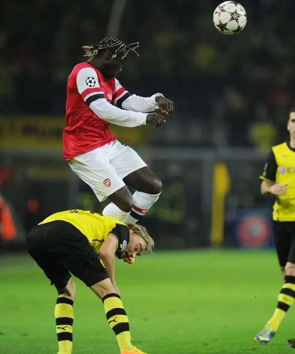 Framed Print : Battleground Bundesliga: Sagna vs. Subotic - Arsenal vs. Borussia Dortmund, UEFA Champions League, 2013 Framed Print : Battleground Bundesliga: Sagna vs. Subotic - Arsenal vs. Borussia Dortmund, UEFA Champions League, 2013