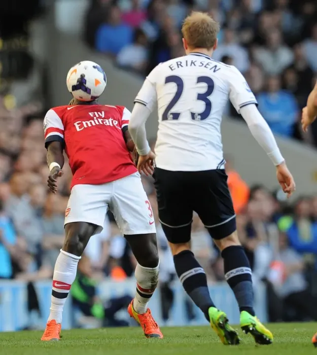 Framed Print : Battling for Control: Sagna vs. Eriksen in the Premier League Showdown