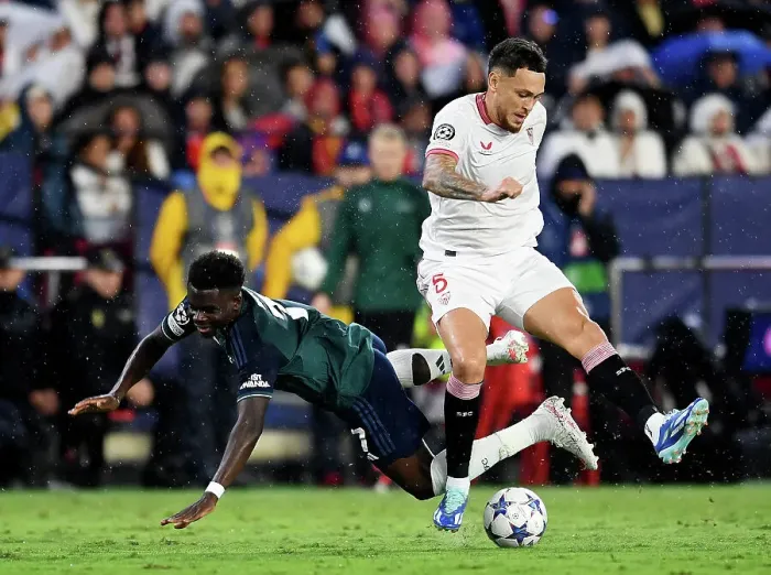 Framed Print : Battling for Possession: Sevilla vs. Arsenal - UEFA Champions League 2023 / 24