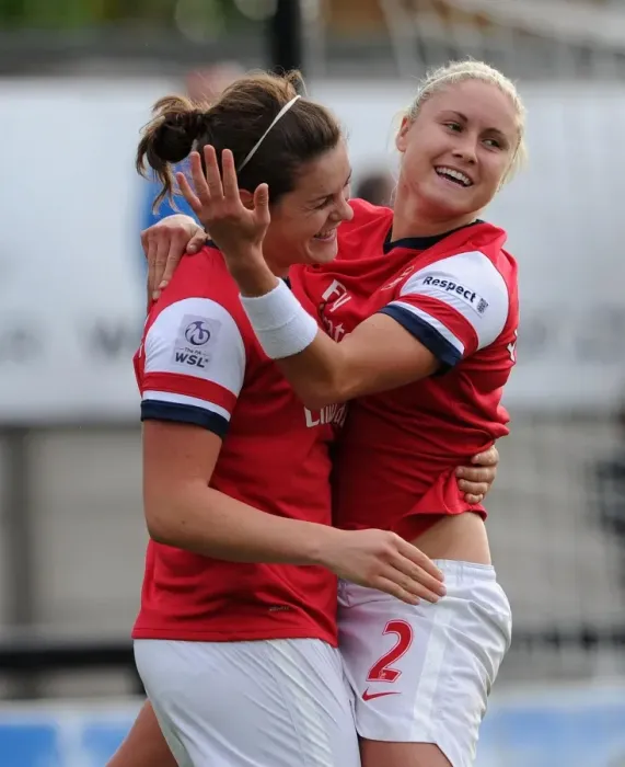 Framed Print : Beattie and Houghton's Unforgettable Goal Celebration: Arsenal Ladies FC vs. Barcelona in the UEFA Women's Champions League