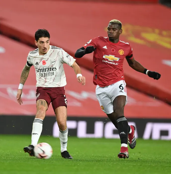 Framed Print : Bellerin Outsmarts Pogba: Thrilling Arsenal Victory at Old Trafford, 2020-21 Premier League (Behind Closed Doors)