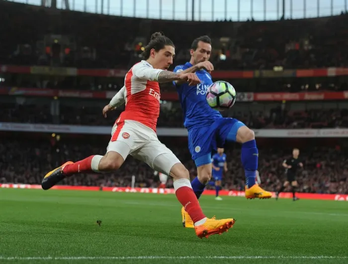Framed Print : Bellerin vs. Fuchs: A Football Rivalry Clash at the Emirates