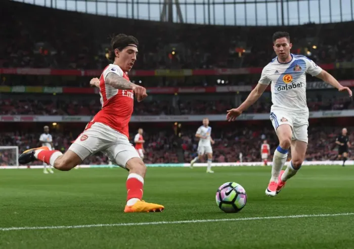 Framed Print : Bellerin vs. Oviedo: A Premier League Showdown at Emirates Stadium Framed Print : Bellerin vs. Oviedo: A Premier League Showdown at Emirates Stadium