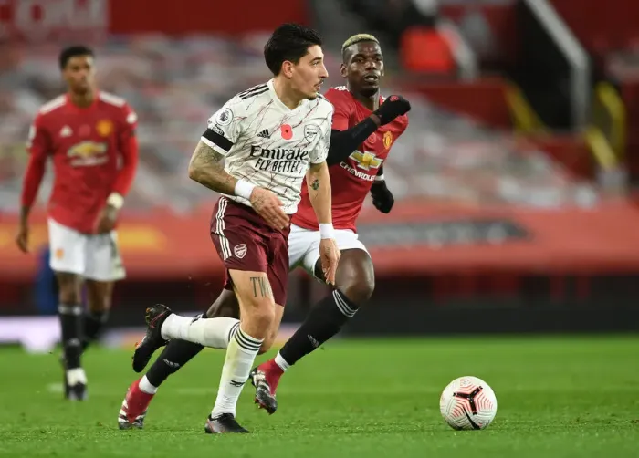 Framed Print : Bellerin vs Pogba: Manchester United vs Arsenal, Premier League 2020-21 (Behind Closed Doors)