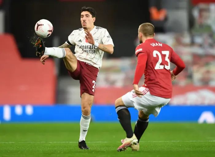 Framed Print : Bellerin vs Shaw: Empty Old Trafford Rivalry - 2020-21 Premier League