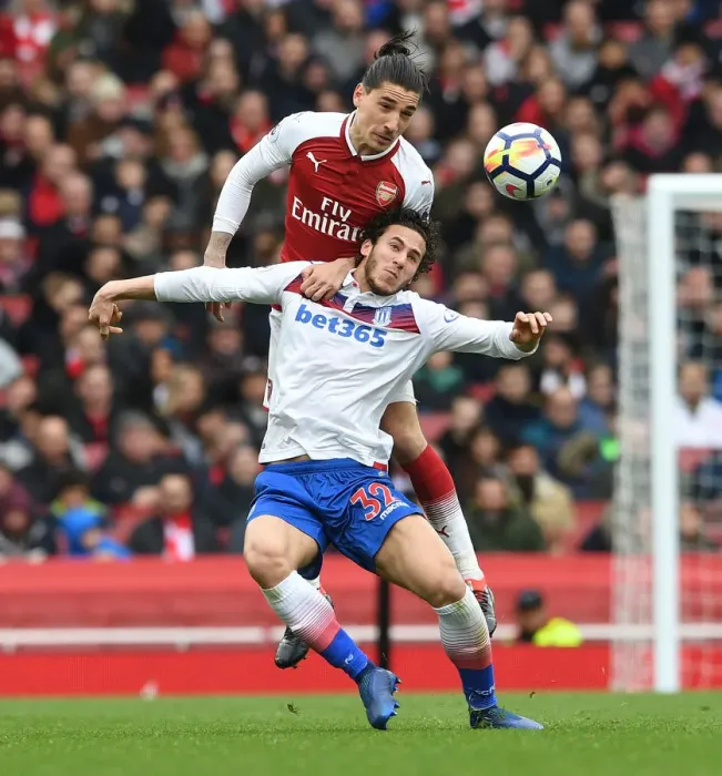 Framed Print : Bellerin vs. Sobhi: A Battle at the Emirates - Arsenal's Clash with Stoke City