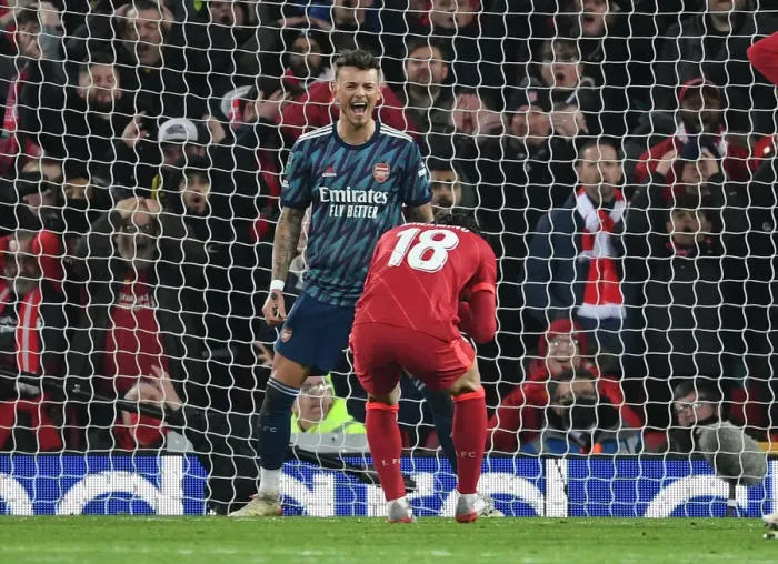 Framed Print : Ben White Reacts as Minamino Shoots Over: Liverpool vs Arsenal in Carabao Cup Semi-Final Framed Print : Ben White Reacts as Minamino Shoots Over: Liverpool vs Arsenal in Carabao Cup Semi-Final