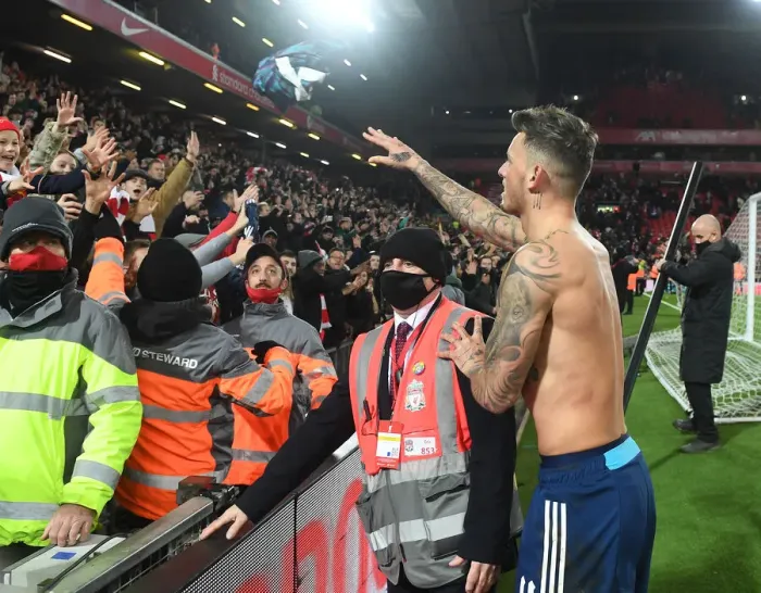 Framed Print : Ben White's Shirt Throw: Liverpool vs Arsenal in Carabao Cup Semi-Final First Leg