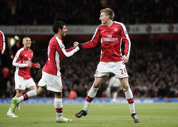Bendtner and Vela's Jubilant Moment: Arsenal's Unforgettable 4:0 FA Cup Victory Over Cardiff City