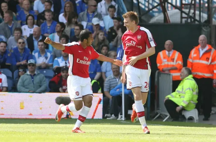 Framed Print : Bendtner and Walcott: Celebrating Arsenal's First Goal in a 4-0 Victory over Portsmouth