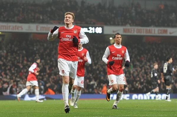 Bendtner's Brace: Arsenal's Dominance Over Leyton Orient in FA Cup Fifth Round (4-0)